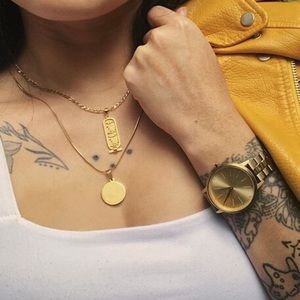 Nixon gold Kensington watch